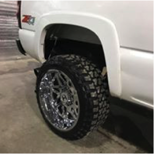 Custom wheels on a pick up